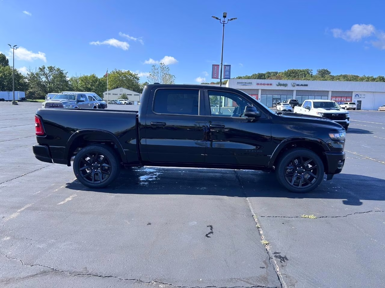 2026 Diamond Black Crystal Pearlcoat Ram 1500 Laramie 4X4 Truck