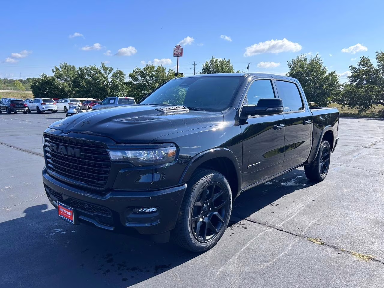 2026 Diamond Black Crystal Pearlcoat Ram 1500 Laramie 4X4 Truck