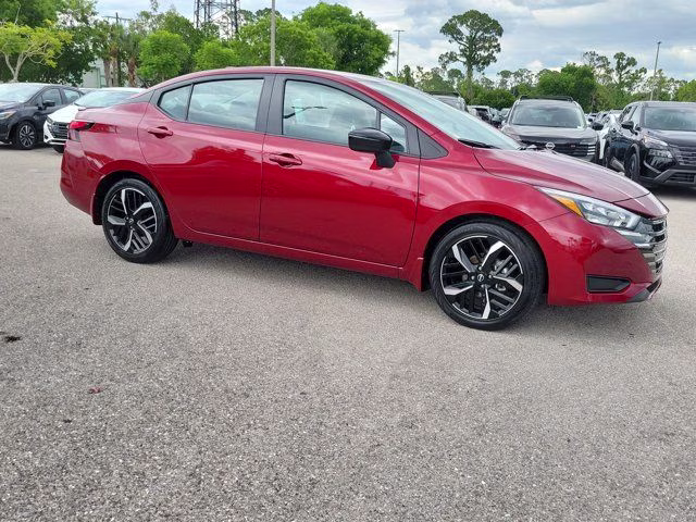 2025 Scarlet Ember Tintcoat Nissan Versa 1.6 SR FWD Sedan