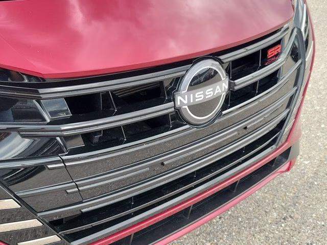 2025 Scarlet Ember Tintcoat Nissan Versa 1.6 SR FWD Sedan