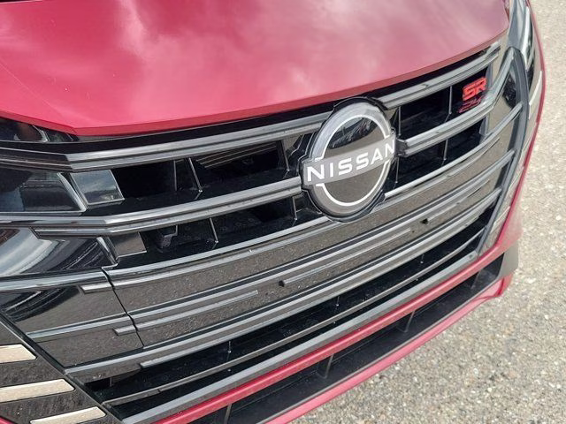 2025 Scarlet Ember Tintcoat Nissan Versa 1.6 SR FWD Sedan