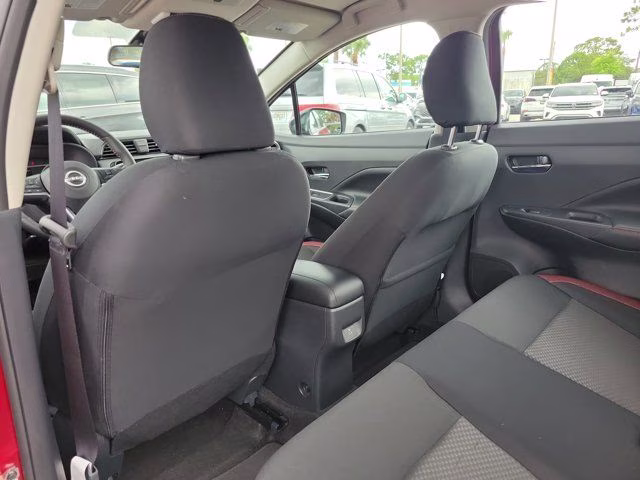 2025 Scarlet Ember Tintcoat Nissan Versa 1.6 SR FWD Sedan