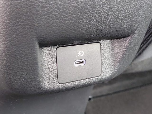 2025 Scarlet Ember Tintcoat Nissan Versa 1.6 SR FWD Sedan