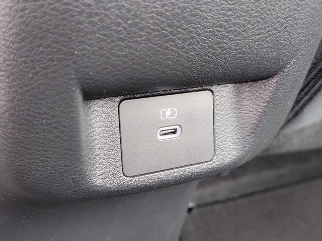 2025 Scarlet Ember Tintcoat Nissan Versa 1.6 SR FWD Sedan