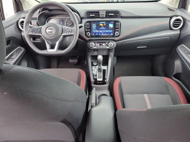 2025 Scarlet Ember Tintcoat Nissan Versa 1.6 SR FWD Sedan