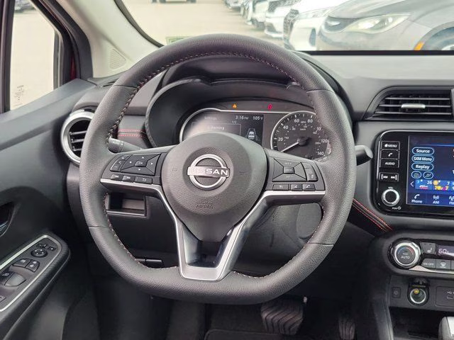 2025 Scarlet Ember Tintcoat Nissan Versa 1.6 SR FWD Sedan