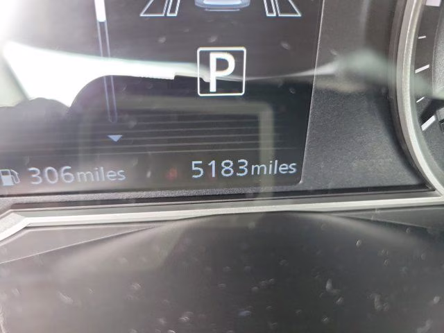 2025 Scarlet Ember Tintcoat Nissan Versa 1.6 SR FWD Sedan