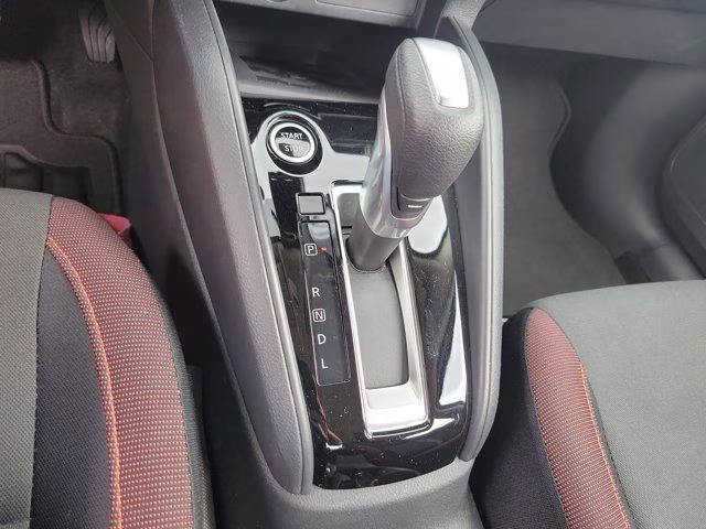 2025 Scarlet Ember Tintcoat Nissan Versa 1.6 SR FWD Sedan