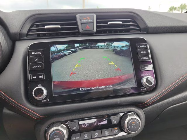 2025 Scarlet Ember Tintcoat Nissan Versa 1.6 SR FWD Sedan