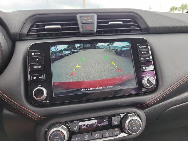2025 Scarlet Ember Tintcoat Nissan Versa 1.6 SR FWD Sedan