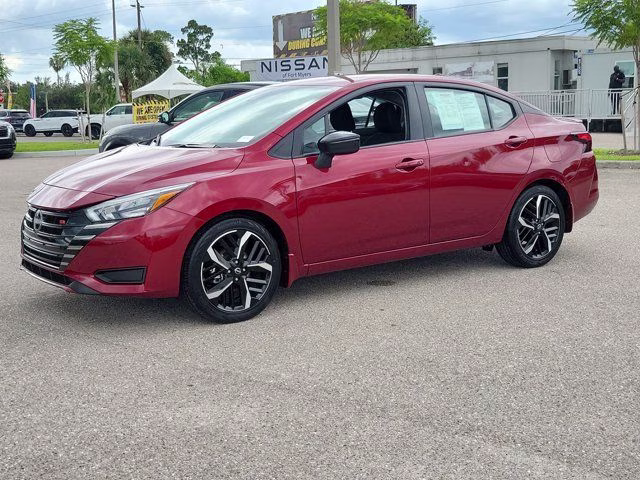 2025 Scarlet Ember Tintcoat Nissan Versa 1.6 SR FWD Sedan