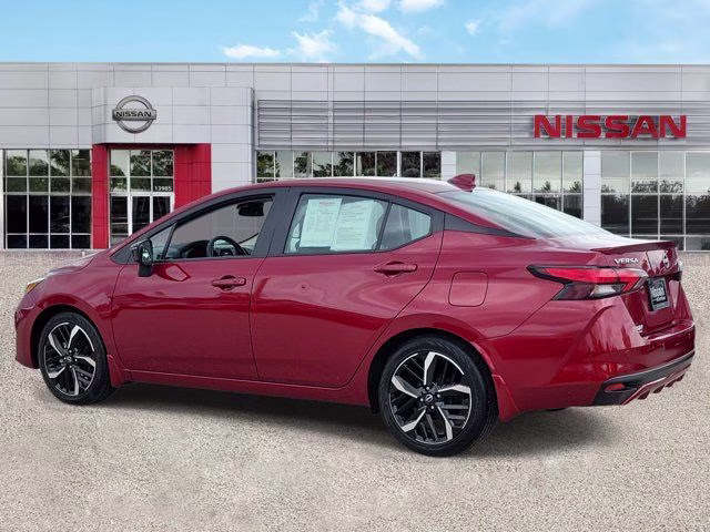 2025 Scarlet Ember Tintcoat Nissan Versa 1.6 SR FWD Sedan