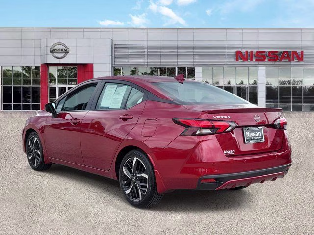 2025 Scarlet Ember Tintcoat Nissan Versa 1.6 SR FWD Sedan