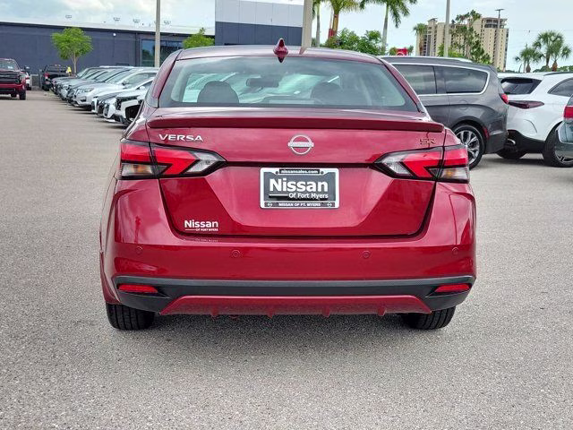 2025 Scarlet Ember Tintcoat Nissan Versa 1.6 SR FWD Sedan