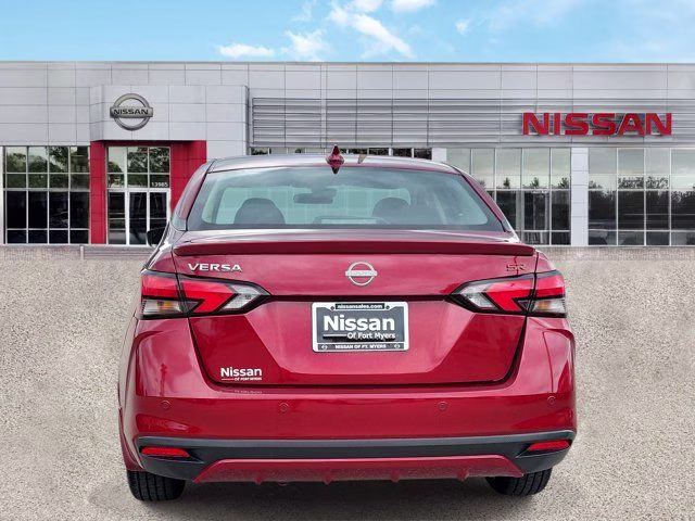2025 Scarlet Ember Tintcoat Nissan Versa 1.6 SR FWD Sedan