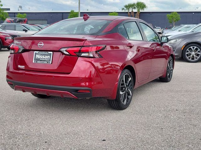 2025 Scarlet Ember Tintcoat Nissan Versa 1.6 SR FWD Sedan