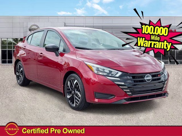 2025 Scarlet Ember Tintcoat Nissan Versa 1.6 SR FWD Sedan
