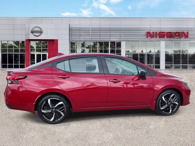 2025 Scarlet Ember Tintcoat Nissan Versa 1.6 SR FWD Sedan