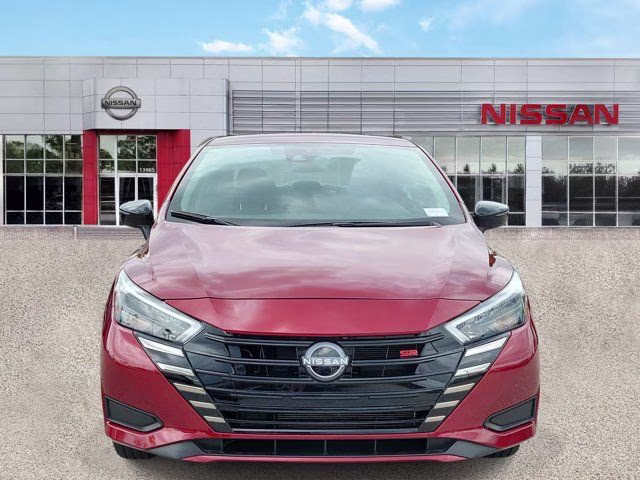 2025 Scarlet Ember Tintcoat Nissan Versa 1.6 SR FWD Sedan