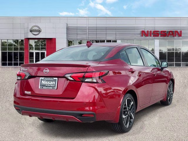 2025 Scarlet Ember Tintcoat Nissan Versa 1.6 SR FWD Sedan