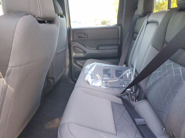 2026 Glacier White Nissan Frontier SV 4X4 Truck