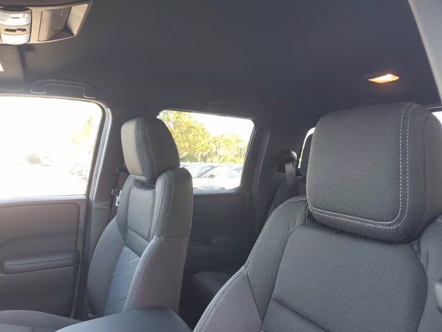 2026 Glacier White Nissan Frontier SV 4X4 Truck