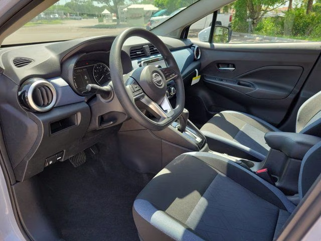 2025 Gray Sky Pearl Nissan Versa 1.6 SV FWD Sedan