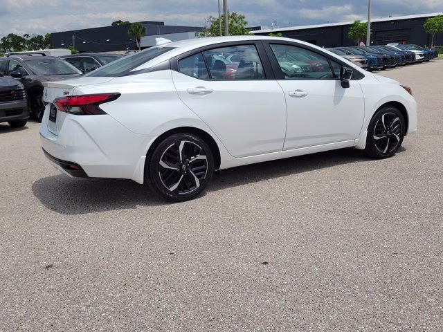 2025 Aspen White Tricoat Nissan Versa 1.6 SR FWD Sedan