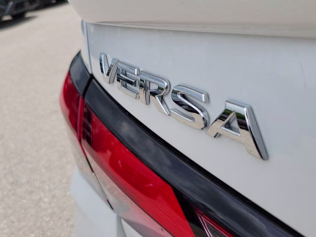 2025 Aspen White Tricoat Nissan Versa 1.6 SR FWD Sedan