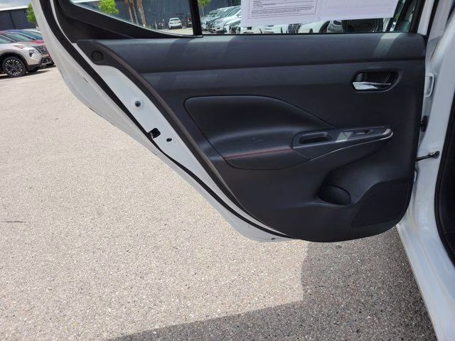 2025 Aspen White Tricoat Nissan Versa 1.6 SR FWD Sedan