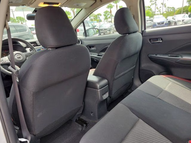 2025 Aspen White Tricoat Nissan Versa 1.6 SR FWD Sedan