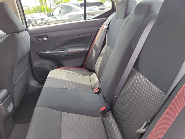 2025 Aspen White Tricoat Nissan Versa 1.6 SR FWD Sedan
