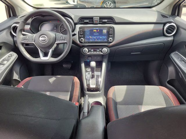 2025 Aspen White Tricoat Nissan Versa 1.6 SR FWD Sedan