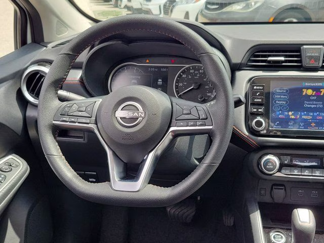 2025 Aspen White Tricoat Nissan Versa 1.6 SR FWD Sedan