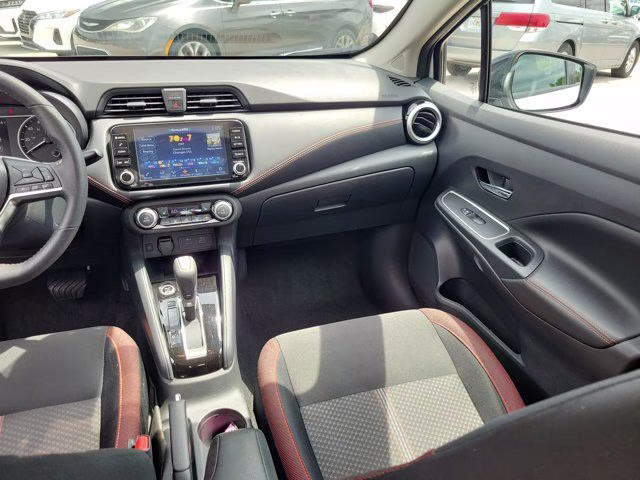 2025 Aspen White Tricoat Nissan Versa 1.6 SR FWD Sedan