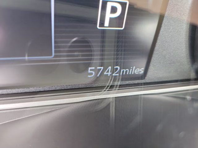 2025 Aspen White Tricoat Nissan Versa 1.6 SR FWD Sedan
