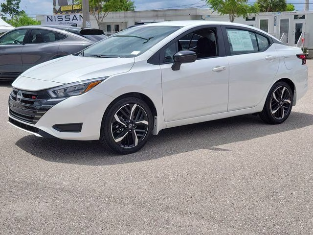 2025 Aspen White Tricoat Nissan Versa 1.6 SR FWD Sedan