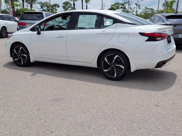 2025 Aspen White Tricoat Nissan Versa 1.6 SR FWD Sedan