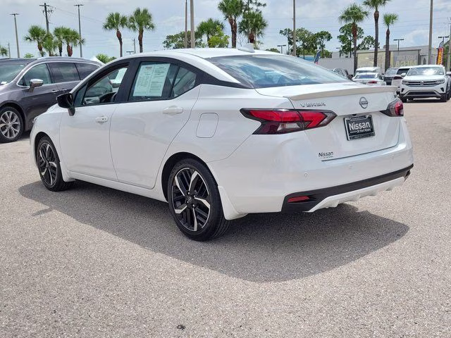 2025 Aspen White Tricoat Nissan Versa 1.6 SR FWD Sedan
