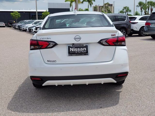 2025 Aspen White Tricoat Nissan Versa 1.6 SR FWD Sedan