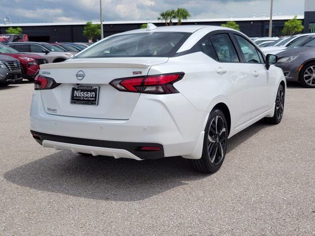 2025 Aspen White Tricoat Nissan Versa 1.6 SR FWD Sedan