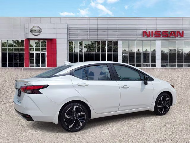 2025 Aspen White Tricoat Nissan Versa 1.6 SR FWD Sedan
