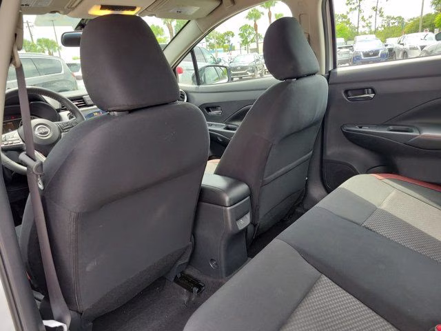 2025 Aspen White Tricoat Nissan Versa 1.6 SR FWD Sedan