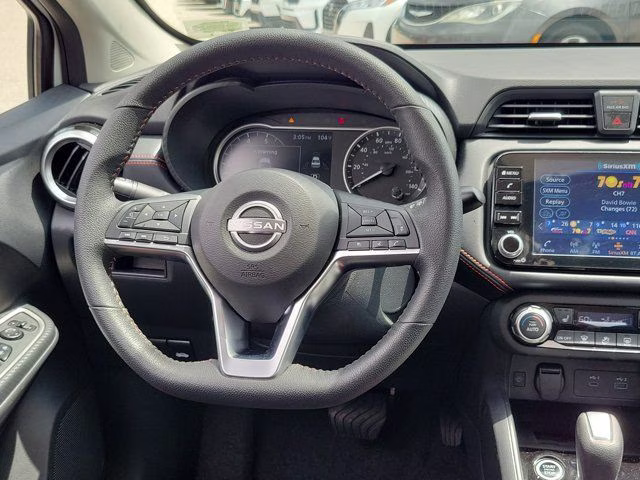 2025 Aspen White Tricoat Nissan Versa 1.6 SR FWD Sedan
