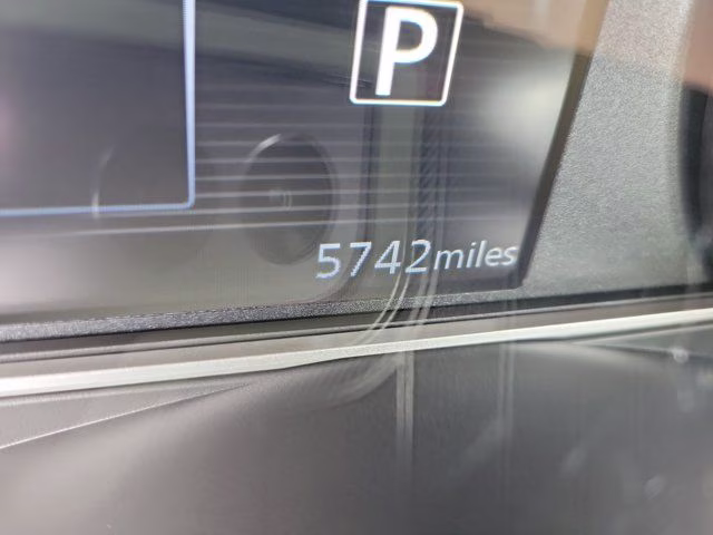 2025 Aspen White Tricoat Nissan Versa 1.6 SR FWD Sedan