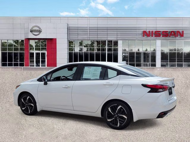 2025 Aspen White Tricoat Nissan Versa 1.6 SR FWD Sedan
