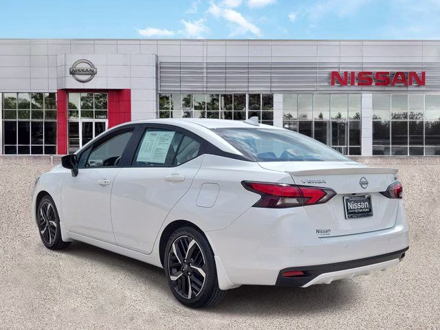 2025 Aspen White Tricoat Nissan Versa 1.6 SR FWD Sedan