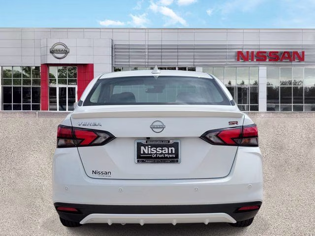 2025 Aspen White Tricoat Nissan Versa 1.6 SR FWD Sedan
