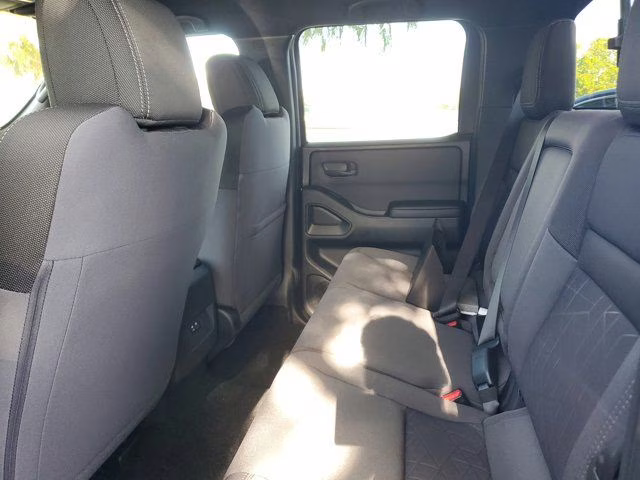 2026 Glacier White Nissan Frontier SV 4X4 Truck