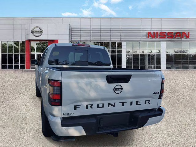 2026 Glacier White Nissan Frontier SV 4X4 Truck